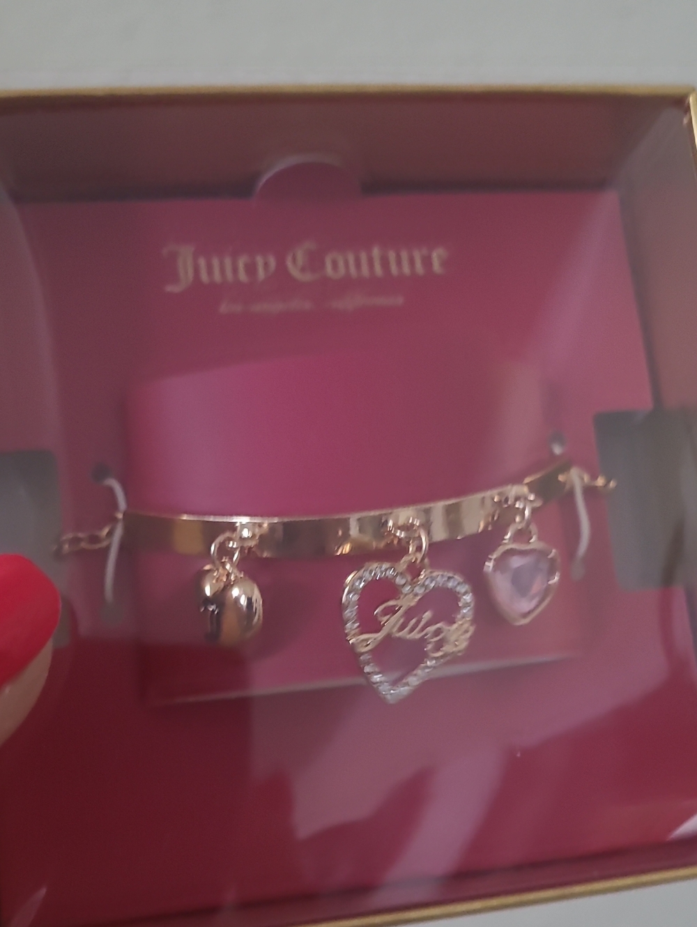 Juicy Couture Pink Charm Bracelet with Gold-Tone Hearts